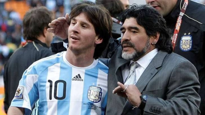 Messi next to Maradona